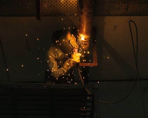 Man welding in protective gear