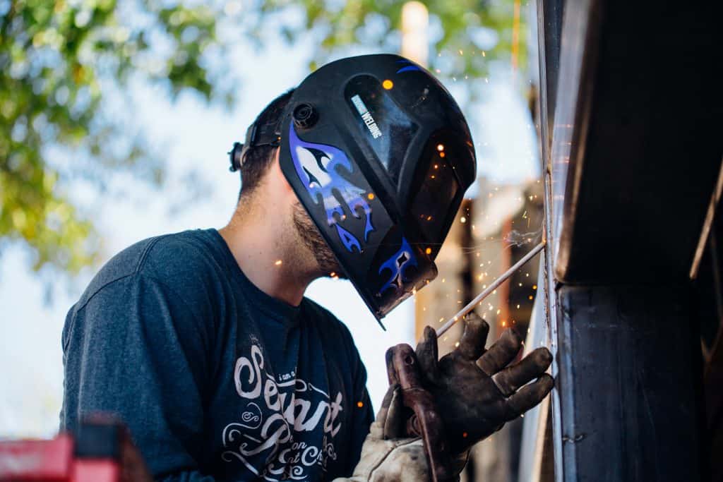 man welding
